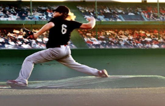 Kasey throwing baseball in stretched image