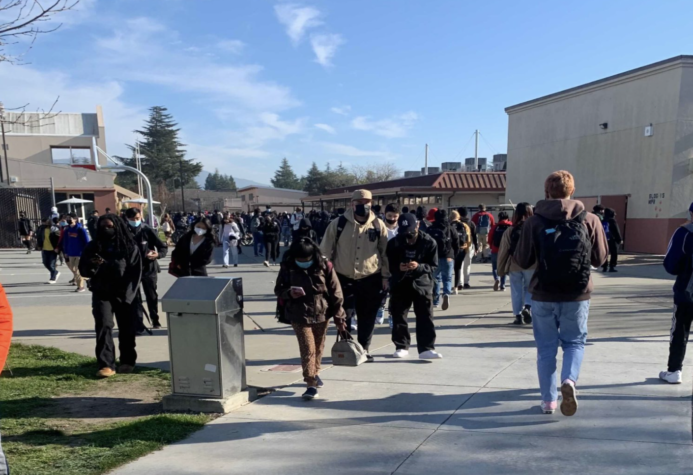 Students walking with masks on at Washington High School.